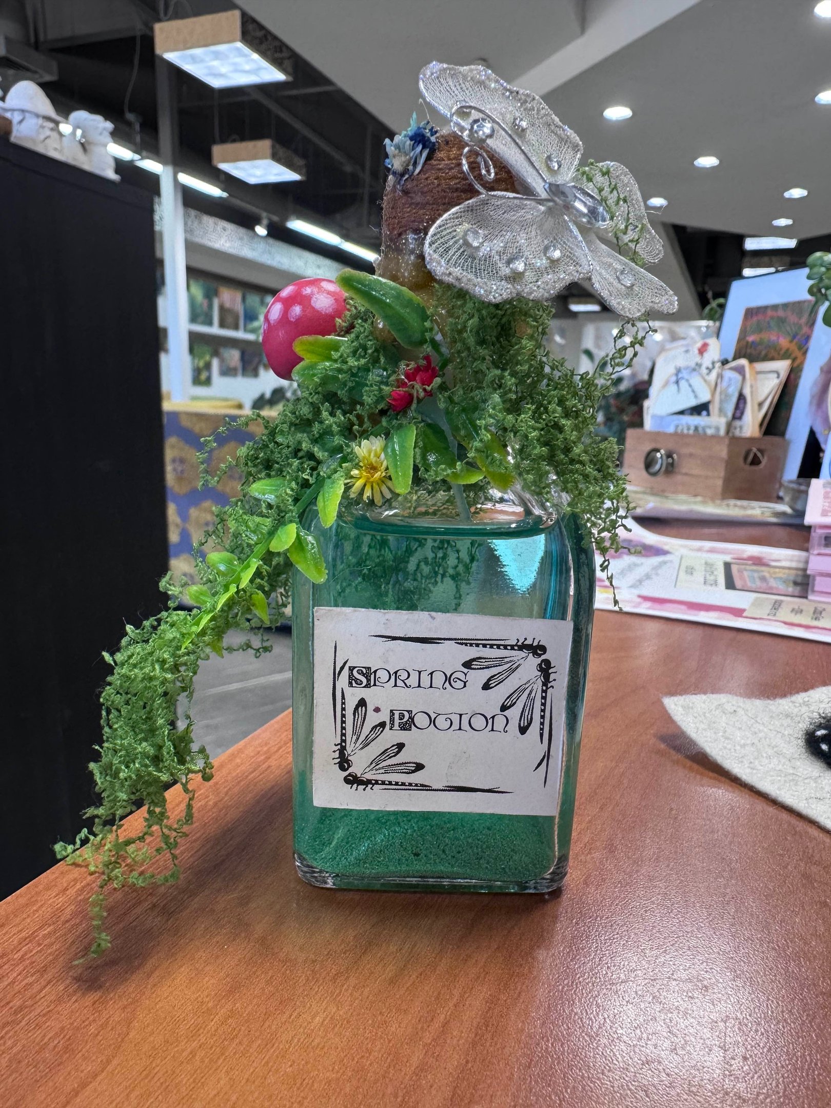 A handmade potion bottle with decorations